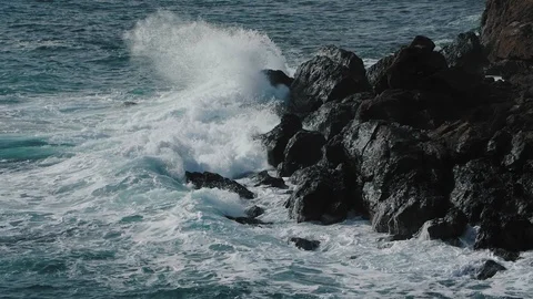 Sea waves crushing on rocks slow motion Stock Footage 101085782