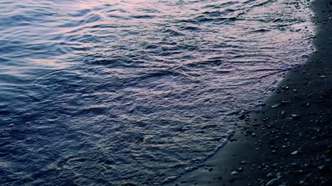 Sea Waves Falling on the Black Sand Beach in the Moonlight Close-up. Ocean in Mo Stock Footage 283725949