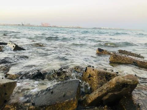 Sea waves Flows on the rocks Stock Photos