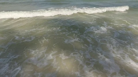 Sea waves with foam, background. Restless dirty water. Stock Footage 88386909