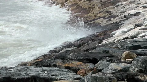 Sea waves foam rocks breakers shore storm Stock Footage 48624579