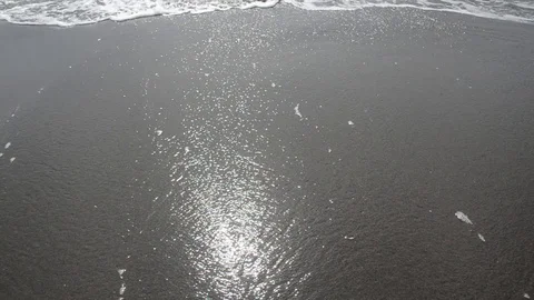 Sea waves with foam on sandy beach at summer. Ocean soft waves Stock Footage 116660608
