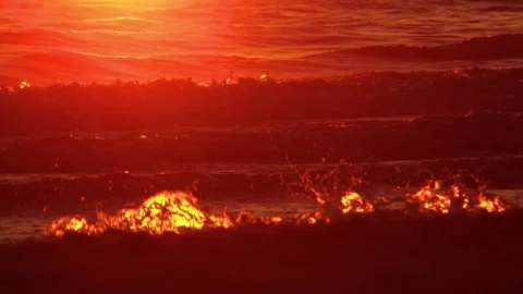 Sea waves highlighted by the setting sun Stock Footage 150079206