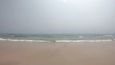 Sea waves that hit beach and island in sea Background clouds and light Stock Footage 132446949