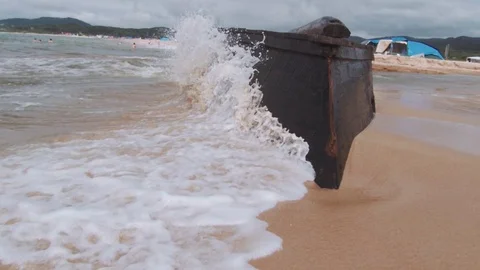 Sea waves hit a sunken ship Stock Footage 127686443