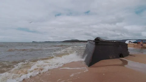 Sea waves hit a sunken ship Stock Footage 127688902