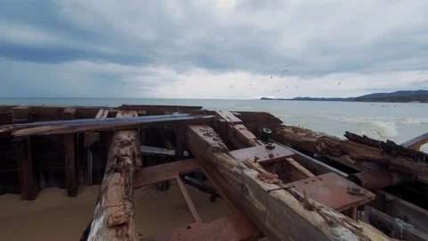 Sea waves hit a sunken ship Stock Footage 127693067