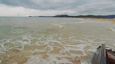 Sea waves hit a sunken ship Stock Footage 127695672
