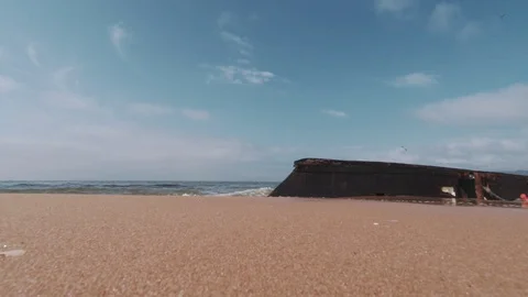 Sea waves hit a sunken ship Stock Footage 127697266