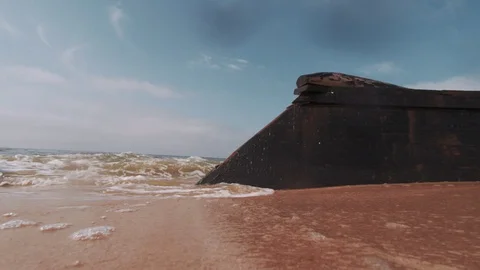 Sea waves hit a sunken ship Stock Footage 127698329