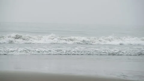 Sea Waves Hits The Sandy Shore On Cloudy Day Stock Footage 261183397