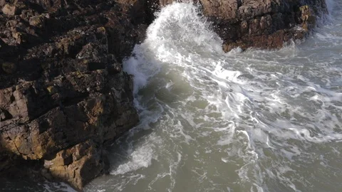 Sea waves hitting against rocks Stock Footage 89968633