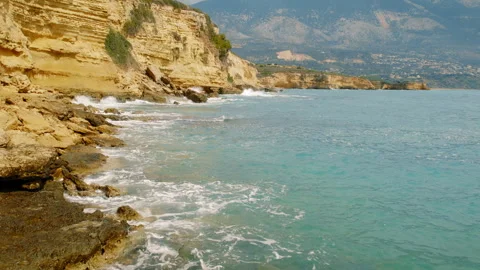 Sea waves hitting limestone cliffs on the coastline in summer Kefalonia, Greece Stock Footage 341292702
