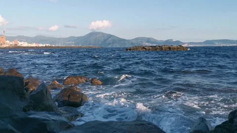 Sea waves hitting rock on the beach. Stock Footage 272476239