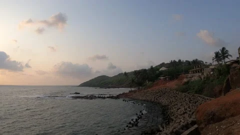 Sea waves hitting rocks on the beach. Amazing rock cliff seascape in Goa Stock Footage 141364473