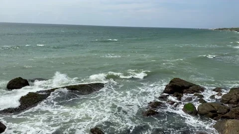 Sea waves hitting rocks on the beach, sea waves, ocean waves Stock Footage 164872359