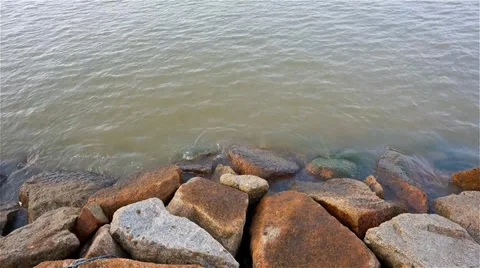 Sea waves hitting rocks 動画素材 35750962