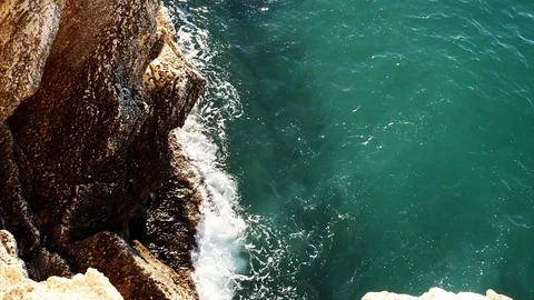 Sea waves hitting the rocks Video stock 78761363