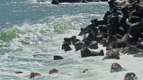 Sea Waves Hitting the Rocks Hard in Winter Stock Footage 310276350
