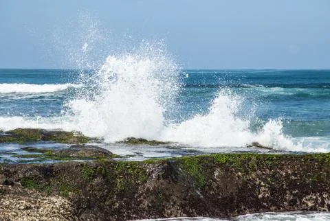 Sea waves hitting the rocks Stock Photos
