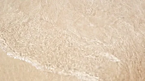 Sea waves hitting the sandy beach . Vídeos de archivo 150416956
