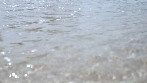 Sea waves hitting the sandy beach . Stock-Footage 150417102
