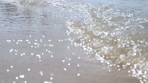 Sea waves hitting the sandy beach . Stock Footage 150417126