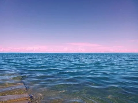 Sea, waves, horizon, clouds Stock Photos