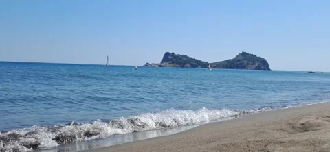 Sea waves with island view Stock Footage 340560573