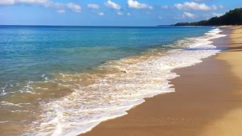 Sea waves on the long idyllic beach Stock Footage 98848939