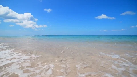 Sea waves on the long idyllic beach Stock Footage 98857412