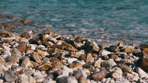 Sea Waves Over Pebble Beach, Color Graded Stock Footage 293245667