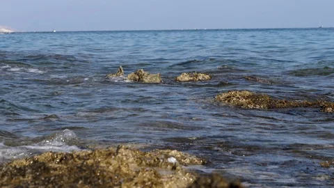Sea waves over rock 3 - slow mo Stock Footage 129199500