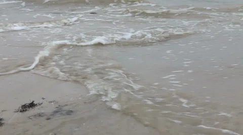 Sea waves over sand beach Stock Footage 37218566