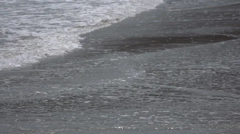 Sea waves over sand beach in slow motion 1 Stock Footage 51023714