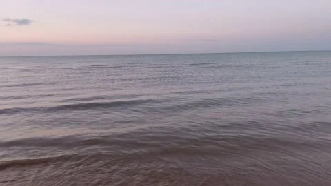 Sea waves over sun light in summer morning Video stock 220676788