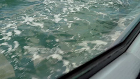 Sea waves passing by vessel window Stock Footage 296083241