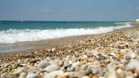 Sea waves on a pebble beach, a beautiful soothing background Stock Footage 161143449