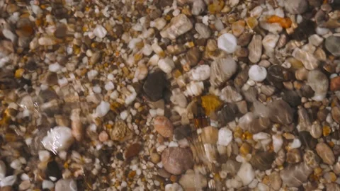 Sea waves on a pebble beach, a beautiful soothing background Stock Footage 161143487