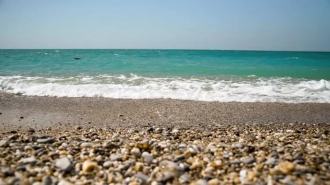 Sea waves on a pebble beach, a beautiful soothing background Stock Footage 161143546