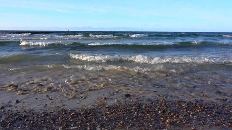 Sea waves on pebble beach with clear water and soothing ocean ambient sound Stock Footage 347199529