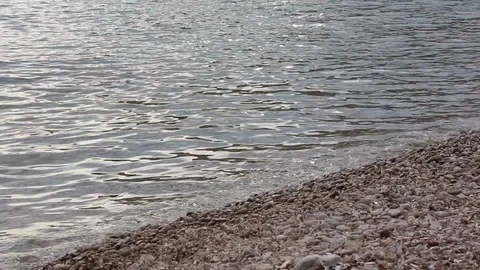Sea waves on the pebble beach Stock Footage 113904329