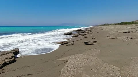 Sea waves on pebble beach texture background. Transparent ocean water Stock Footage 209224605