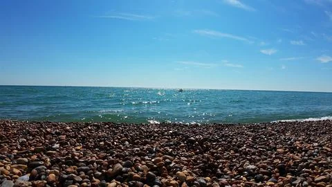 Sea waves on a pebbled beach Foto stock
