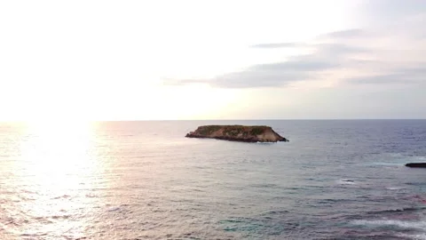 Sea waves in the rays of sunset light in Cyprus. Stock Footage 175057416