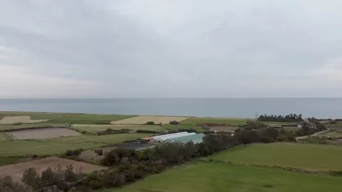 Sea waves in the rays of sunset light in Cyprus. Video stock 175081583