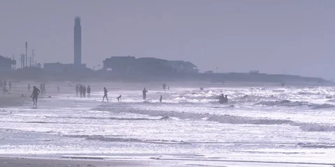 Sea waves reaching the beach at dusk Stock Footage 103486507