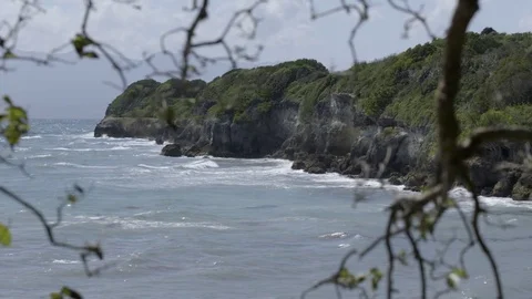 Sea waves reaching the cliff Stock Footage 77809755