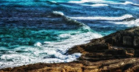 Sea waves at the rocks, coast of Mallorca Foto stock