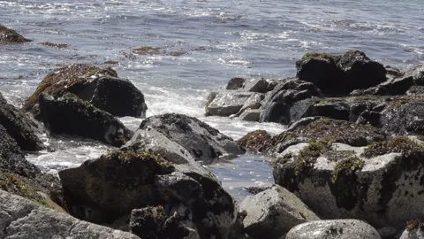 Sea waves on rocky beach Stock Footage 233382762